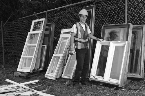 Professionals conducting loft clearance in a Penge home